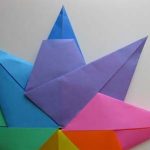 Переворачиваем фигуру на другую сторону и заправляем свободный край первой по счету (фиолетовой) заготовки в «полу» последней (синей) аналогично тому, как мы соединяли заготовки между собой.