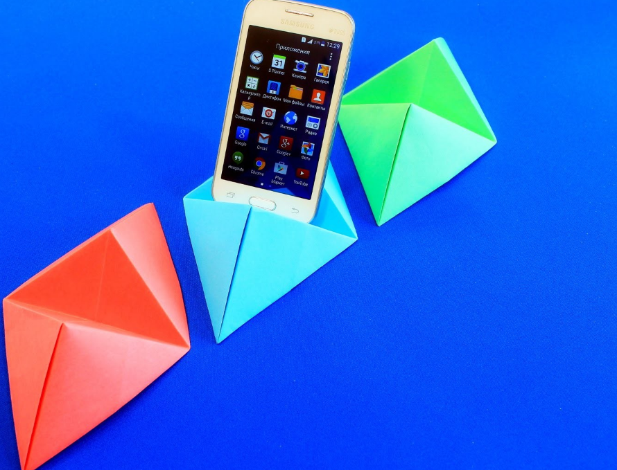 Видео телефоны из бумаги. Оригами подставка для телефона. Телефон из бумаги. Мобильный телефон оригами из бумаги. Модульное оригами подставка для телефона.